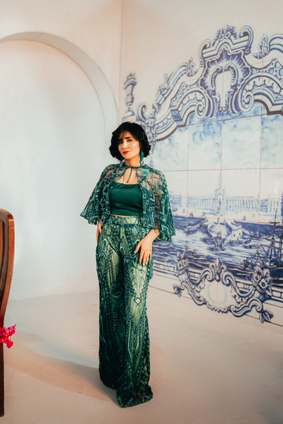 'Green Mosaic Allure' dress by Berry Bosom, captivating with its enigmatic green palette and layered patterns, a stunning addition to the festive collection.